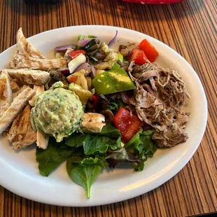 Paleo Plate. I don't think that chicken was grilled in house.