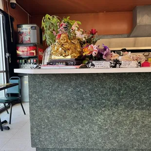 Festive cash register area. Tight squeeze to get to soda fountain.