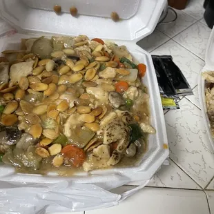 Almond Chicken and vegetables with pan fried noodles underneath!