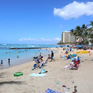 people enjoying the beach