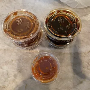 Two sets of sauce since we ordered two plates: katsu, teriyaki and siracha