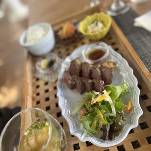 $28 meat lunch option (everything you see on the tray plus one drink) as of 10/30/22.