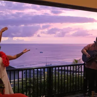 a man and a woman playing music