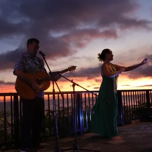Beautiful sunset view with hula dancer