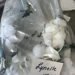 Maili lei with white orchid