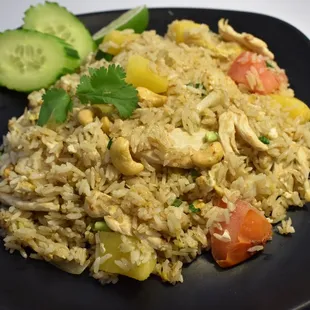 a plate of rice and vegetables