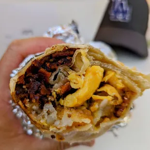 Bacon breakfast burrito. $15. Pandemic prices.. Tiny!.
