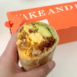 Cross section of the OG Bacon breakfast burrito.