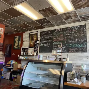 a woman standing in front of the counter