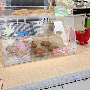 ows a counter with a variety of pastries
