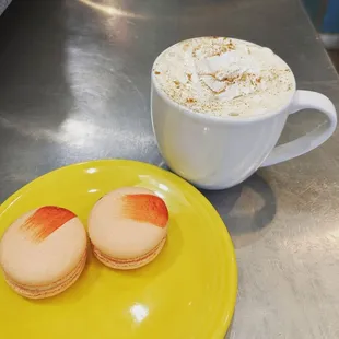 Pumpkin spice latte with pumpkin Spiced Macaron!  Fall is here!