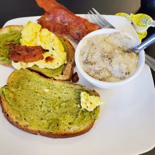 Avocado toast, eggs, grits and bacon, yummy.