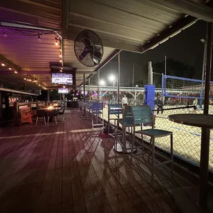 a beach volleyball court at night
