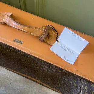 Vintage Louis Vuitton suitcase for sale