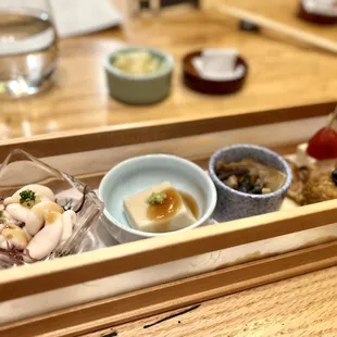 Appetizer set Shirako, sesame tofu, matsutake and daikonleaves with tofu skin, beef croquet, fried fish chips, cream cheese/tomato