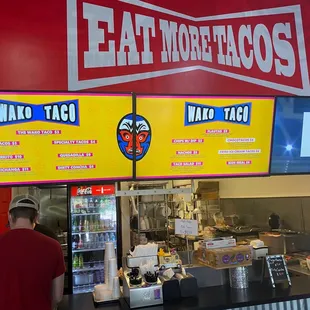 a man standing at a counter