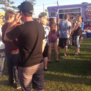 a group of people standing in a line
