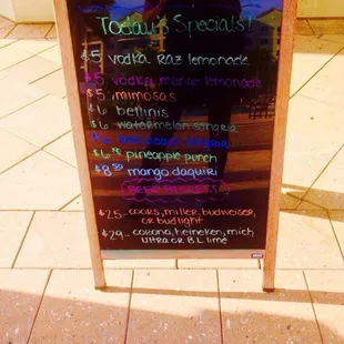 Daily drink specials posted on this board at the Wakoola Bar. :)