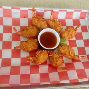 Coconut Shrimp appetizer with sweet chili sauce. 8 for $10.95. Delicious. This is NOT normal "pool bar" food. WOW, yummy!