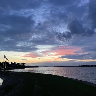 a sunset over the water