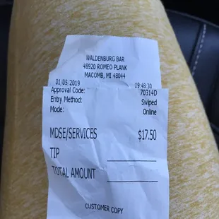This was our tab for 2 Midelos, 1 tall vodka/tonic and 2 shots of Cuervo.