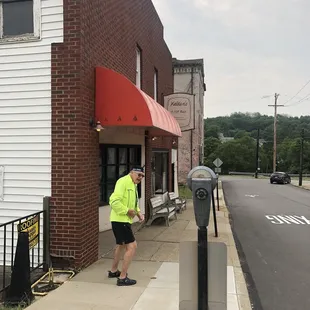 Walking down from the trail. Biking parking to the left.