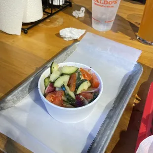 Tomato-cucumber salad. Fresh, crunchy, nice amount of acid to go with fried chicken!