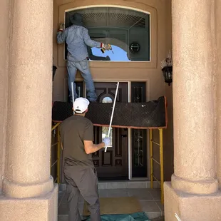 Eyebrow arch double pane picture window