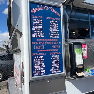 a food truck with menus