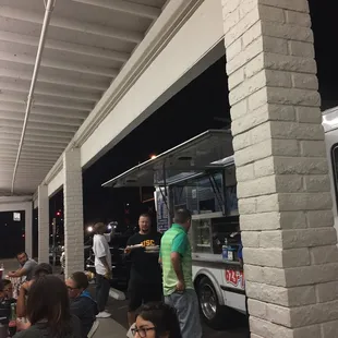 This food truck is busy, and I found out why! The food is bomb.com. Do not judge this TRUCK