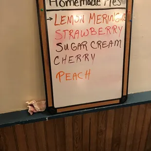 a sign for lemon meringue strawberry sugar cream peach