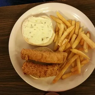 a plate of fish and fries with a side of dip sauce