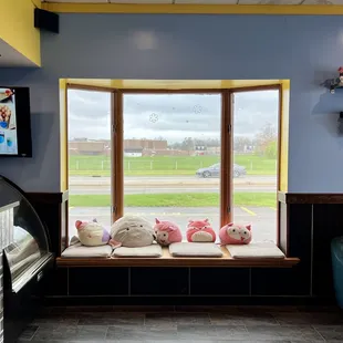 a window with a view of a field