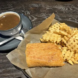 Half Cajun Press sandwich, waffle fries, gumbo