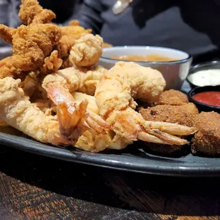 The Louisiana Combo!! Fried Fish, shrimp, etouffe, waffle fries and hush puppies!