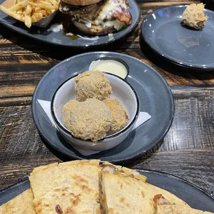 Boudin Balls; Black Jack Chicken Sandwich;  Cajun Queseaux