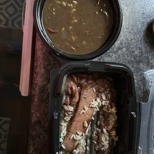 Rectangle container has red beans and rice and gumbo in the round container almost the same price