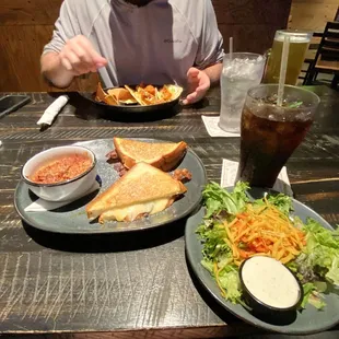 Grown up grilled cheese and side salad and alligator tacos
