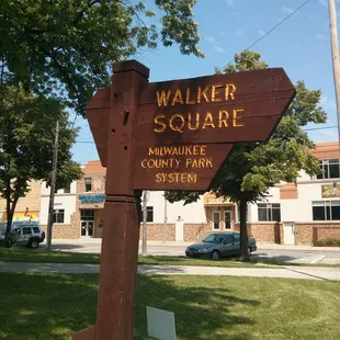 a sign for walker square farmers market