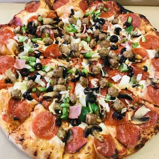 pepperoni, sausage, mushrooms, and onions