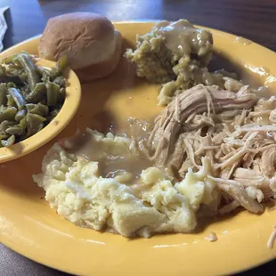 Turkey, mashed potatoes, stuffing, green beans and gravy.  Today's special under 11.00.