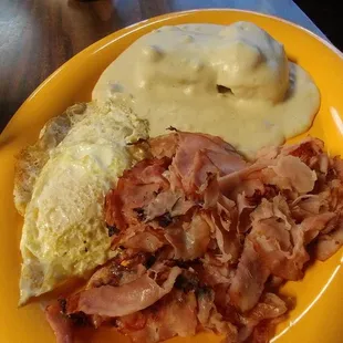 Fried ham with biscuits and gravy