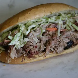 The cochon delait poboy