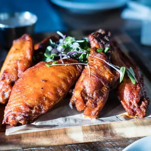 a platter of chicken wings