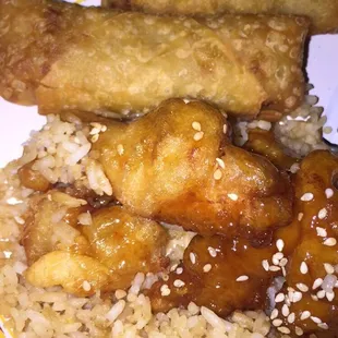 Sesame Chicken, egg rolls, and plain fried rice.