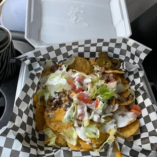 $15 for the nachos and a drink. Not much cheese for the amount of chips they give. Oh and to top it off took a hour for me to get my order