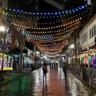 11.20.22 Under the night sky and market lights are 7 venues, outdoor bars, patio seating, Palm trees, DJ&apos;s, bands and more