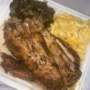 Turkey wings with rice/dressing, collard greens, and Mac &amp; Cheese.