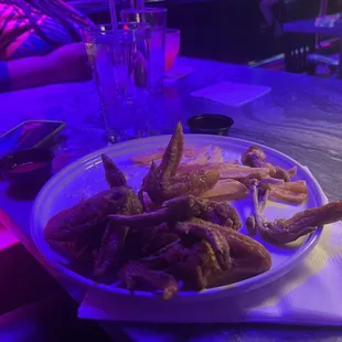 Chicken wings and truffle fries