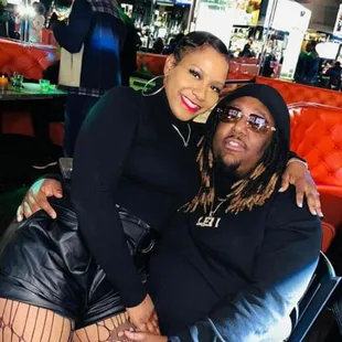 a man and a woman posing for a picture